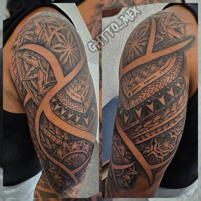Black and grey Polynesian half sleeve with dotwork sun motifs, arrow bands and geometric pattern work